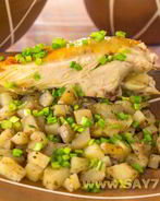 Курица, фаршированная картофелем