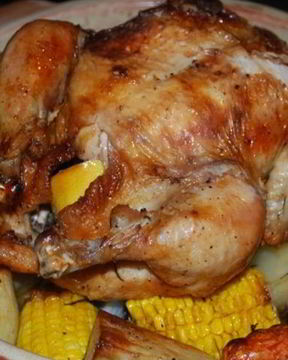 Курица, запеченная целиком с овощами
