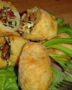 Фаршированный ветчиной и сыром картофель в кляре