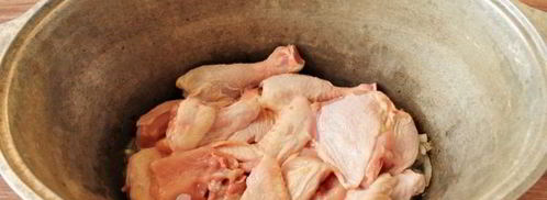 плов с курицей в утятнице на плите. Шаг 7