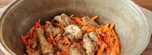 плов с курицей в утятнице на плите. Шаг 10