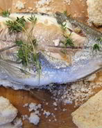 Дорада, запеченная в соли