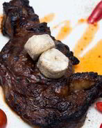 Стейк рибай с ароматным маслом