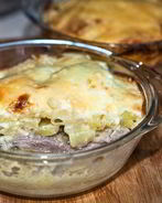 Картошка под шубой в духовке со свининой