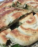 Слоеные лепешки на топленом масле с сезонной зеленью