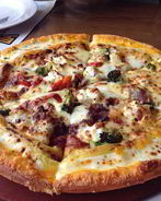 Пицца Деликатесная