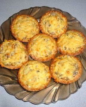 Тарталетки с жульеном в сыре с шампиньонами